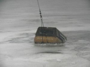 Submerged Pickup Being Pulled up  by Crane